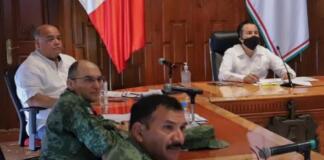 Secretario de Gobierno de Veracruz estaría infectado de COVID-19; se atendería en hospital privado Eric Cisneros, secretario de Gobierno de Veracruz, en reunión el 14 de julio de 2020.