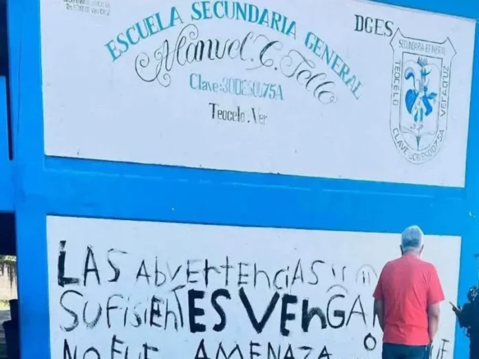 Imagen de amenazas escolares pintadas en la pared de la escuela